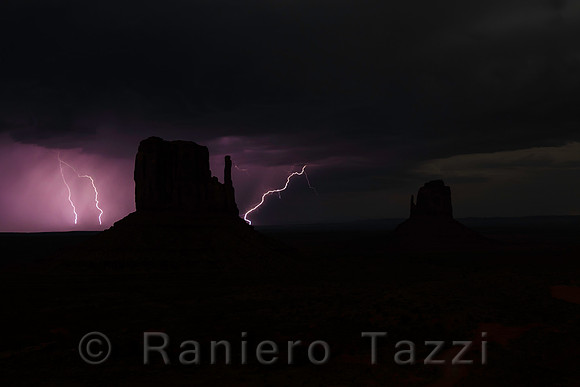 Lightnings in the distance at night, Monument Valley, Utah