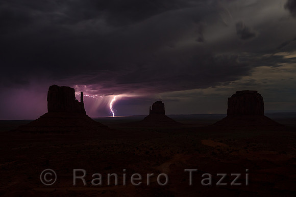 Lightnings in the distance at night, Monument Valley, Utah