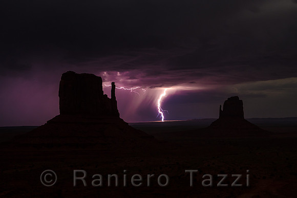 Lightnings in the distance at night, Monument Valley, Utah