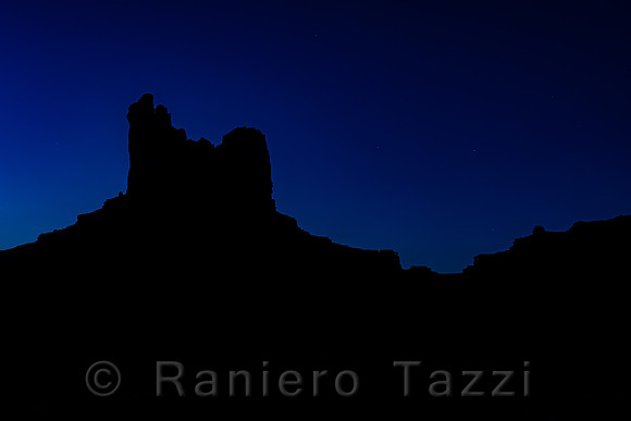 Setting Hen Butte at night, Monument Valley, Utah