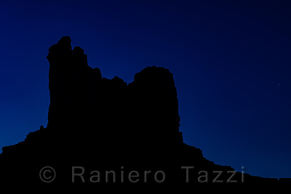 Setting Hen Butte at night, Monument Valley, Utah