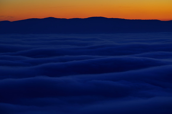 Fog waves at dusk, Assisi, Umbria, Italy