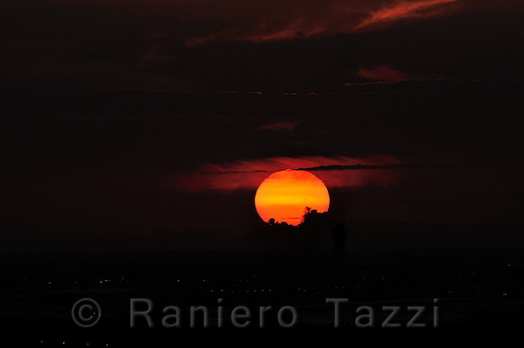 Sunset at Miami International Airport with visible Solar Spots - Florida, Usa